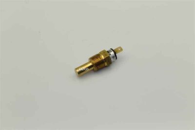 Brass engine shut down switch with a 3/8-inch taper thread size laying on its side.