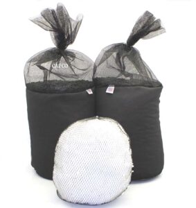 Image of 2 large mesh bags that contain activated carbon and a small mesh bag sitting in front of them.